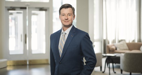 man smiling in tie