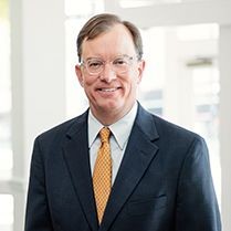 Smiling lawyer with golden tie 