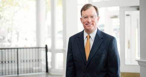 Smiling lawyer with golden tie 