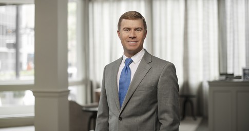 Man with tie smiling