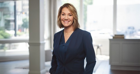 Woman smiling in suit