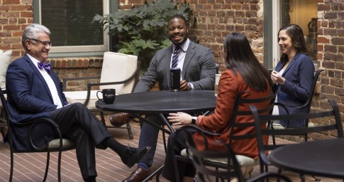 Three Attorneys Talking