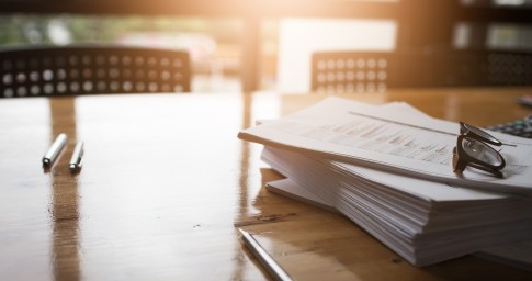 Stack of papers on table